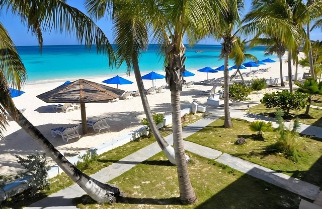 Steps to Shoal Bay Beach! With Full Kitchen & Porch! Car Rental, Pool, Spa!