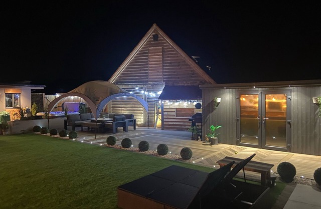 Stunning Modern Barn sleep 24 with Hot Tub , Cinema Room and Games Room .