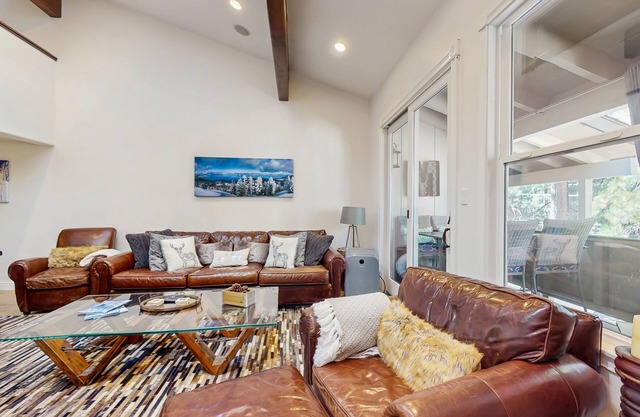 Stunning mountain retreat with pool, balcony views, & fireplace - near skiing