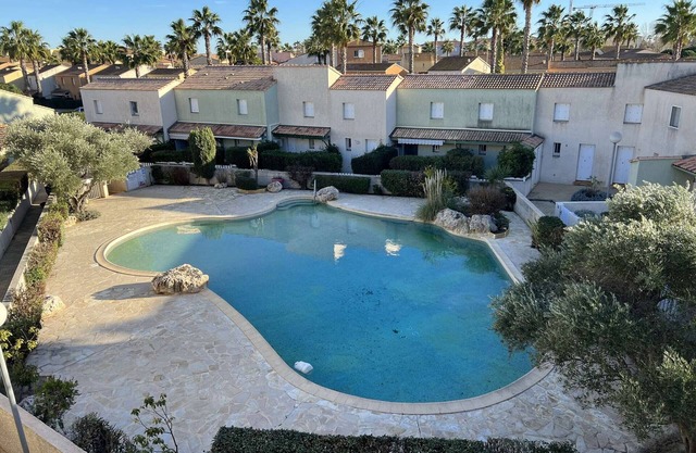 Stylish 2BR Apt with Pool, AC & Terrace - Sleeps 6, 600m from Beach