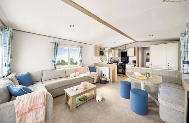 Stylish and modern caravan with one double and two twin.