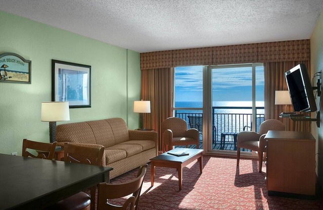 Sun-Kissed Shores Oceanfront Paradise