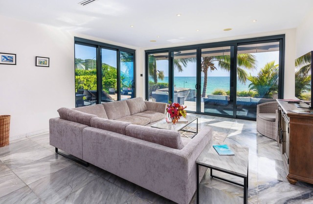 Sun-Soaked Balcony Views in a Coastal Getaway 3 Bedroom Villa with Kitchen
