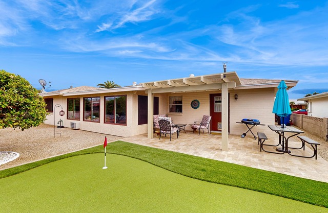 Sunny home with covered patio, grill, pool, tennis, hot tub, full kitchen, & AC