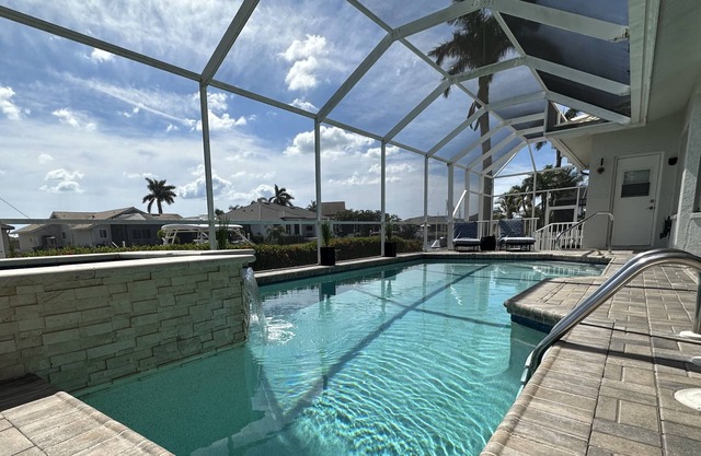 Sunny Pool & Spa inside Lanai! You will Love this fully furnished 3bdrm Home!