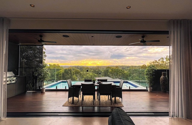 Sunsets views by the infinity pool overlooking a Koala Eucalyptus Reserve.