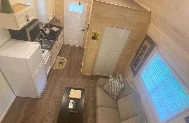 The Denali cabin, beautiful wood interior and vaulted ceilings.