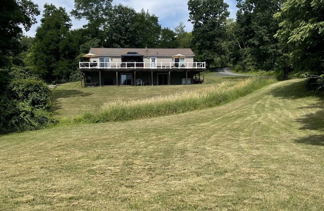 The Hideaway in the Catskills. Sprawling field and game room.