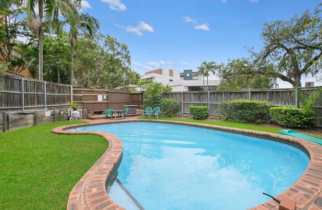 The Poolside Perch - A Breezy Balcony Gem