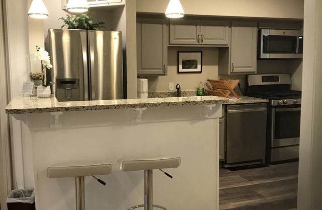 The Stone Abode-2Bdrm/1Ba quiet retreat. A perfect location-close to everything.