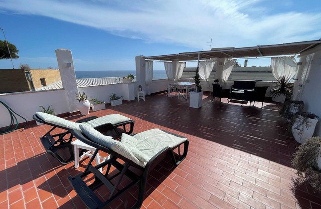 THE TERRACE ON THE SEA