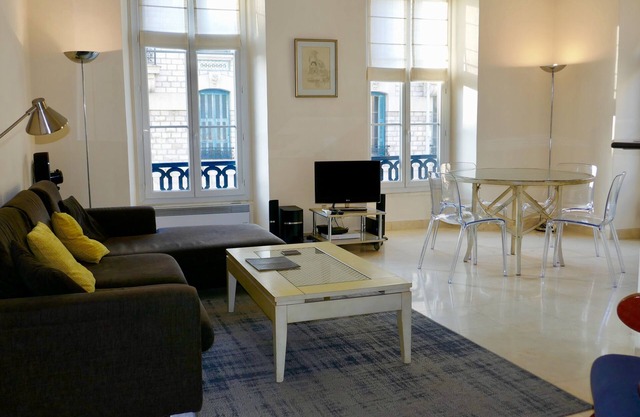 This bright, spacious apartment is located in the heart of the city.