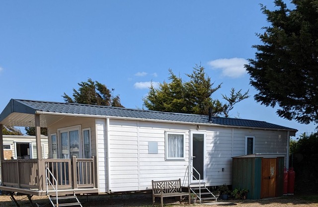 This caravan has a covered and fenced veranda