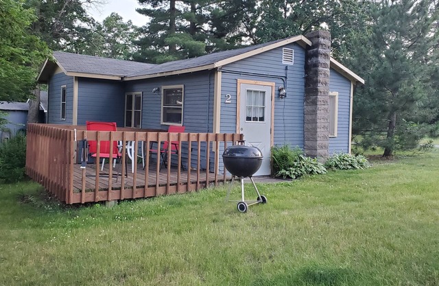 This rustic and charming cabin has great views of Hardy Lake.