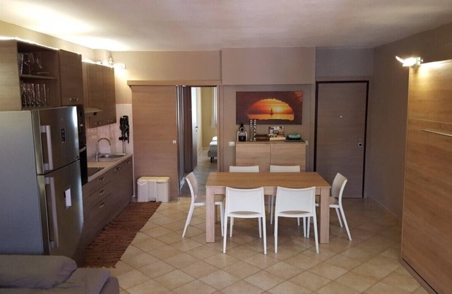 three-room apartment with 2 bathrooms, large terrace and equipped garden.