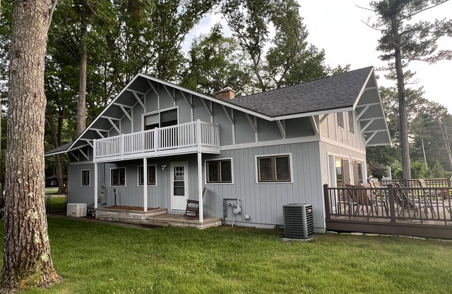 Torch Lake home, south end of lake, sandy beach, mile-and-a-half from sand bar!
