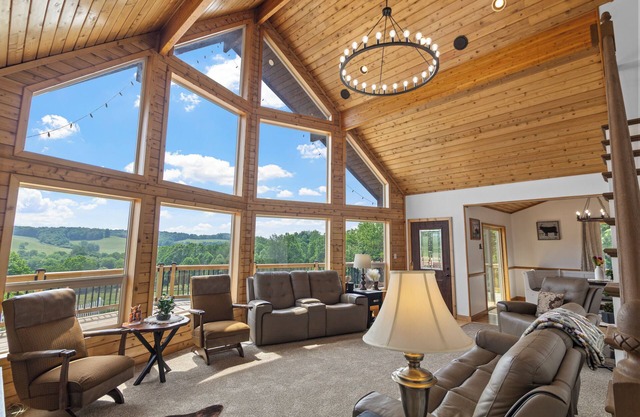 Tranquil 12-acre cabin w/Hocking Hills views, pool, hot tub, games & sleeps 18+