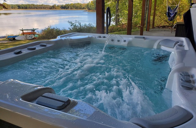 Tranquil Lakefront Log Cabin with Breathtaking Views.