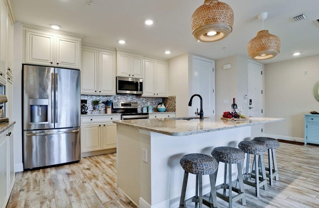 Two bedroom luxury resort condo near AMI, pet friendly and elevator.