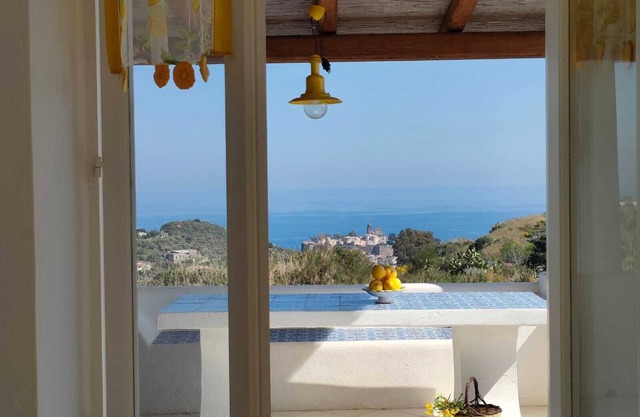 Typical Aeolian house surrounded by Mediterranean nature