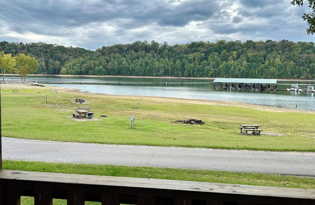 Unwind in Albany, Kentucky at this charming 3 BEDROOM cabin on the water.