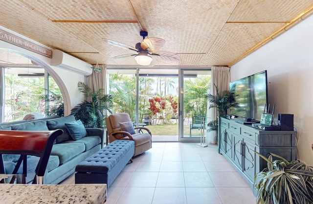 Updated tropical condo with great location, pool access, and central AC