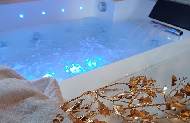 Upscale suite with private spa and indoor pool.