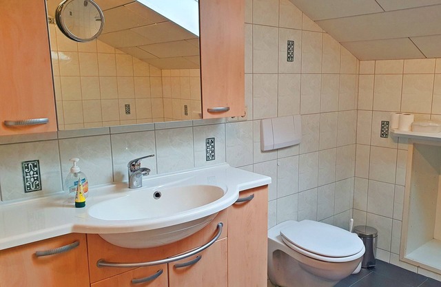 Vacation apartment 95 sqm, for 2-5 pers., 2 bedrooms, kitchen with dishwasher, spacious living room with balcony. Living room, balcony.