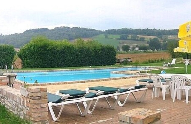 Villa Pavone D: A graceful studio apartment surrounded by the greenery, with Free WI-FI.