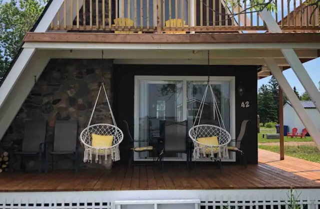 Water view cottage with hot tub, beach access and fire pit