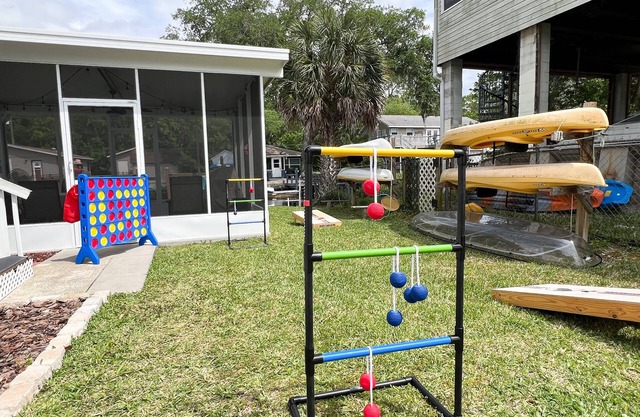Waterfront-ClearKayaks-FishingPoles-ScreenBBQ-SUPs