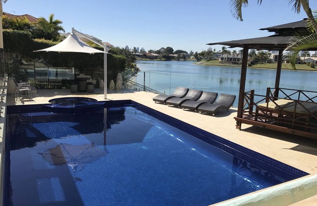 WINNER BEST FAMILY HOLIDAY HOUSE. LUXURY WATERFRONT HOME WITH HEATED POOL , SPA