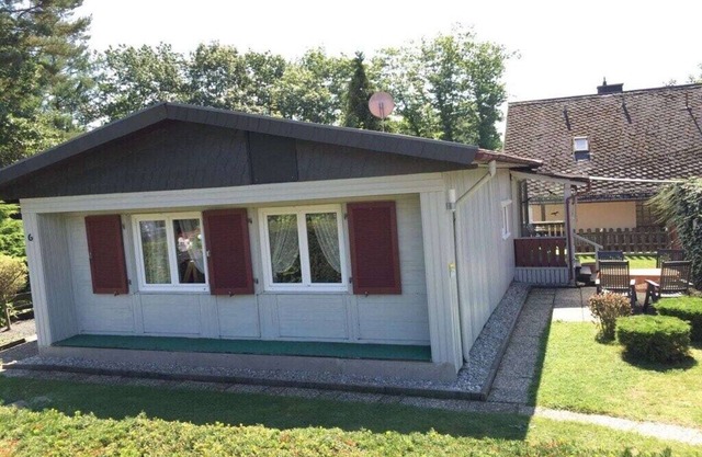 Wooden holiday home with winter garden