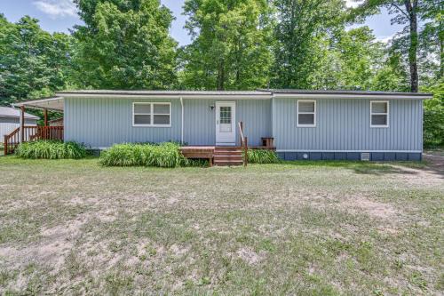 Woodsy 20-Acre Retreat with Hot Tub in Mancelona