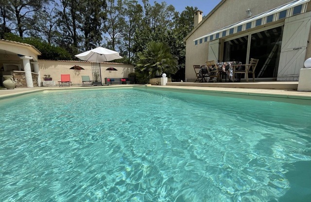 YOUR VACATION UNDER THE CORSICAN SUN BY THE HEATED SWIMMING POOL