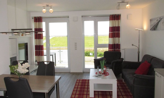 Wurster Nordseekuste Apartment | 100 m from the sea, family-friendly apartment with sea views & swimming pool use