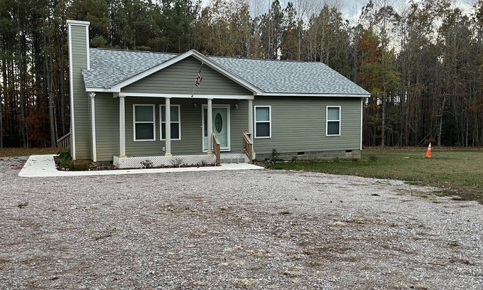 Sutherland House | 1400 Square feet of space, isolate in three acres lot.