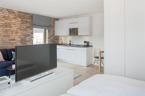 Sankt Alban Apartment | 2,5 Zi Design Loft Wohnung mit Gartensitzplatz