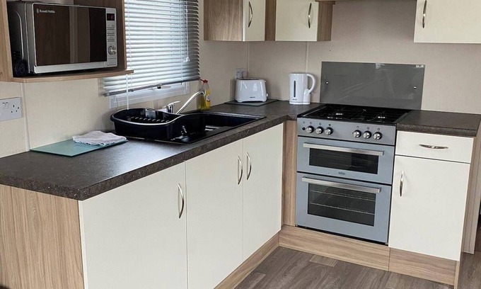 Rhyl Cabin | 2 bed caravan in rhyl , dog friendly, with wifi