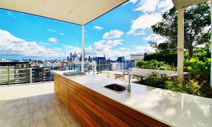 Newstead Apartment | 2BR Food Drink Hub Pool Views Gym Roof Tce