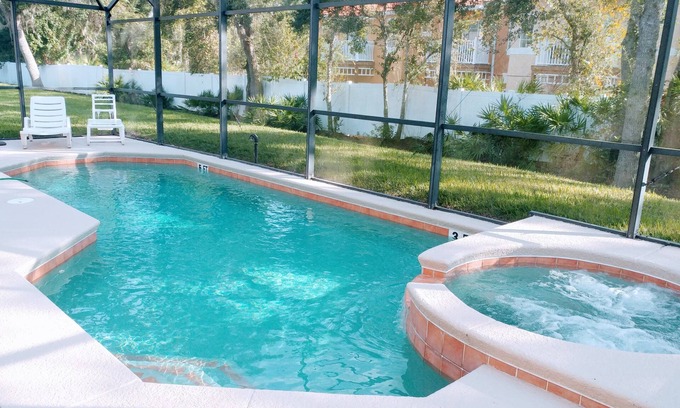 Seasons House | 4 bedroom single story house with south facing pool and spa close to Disney