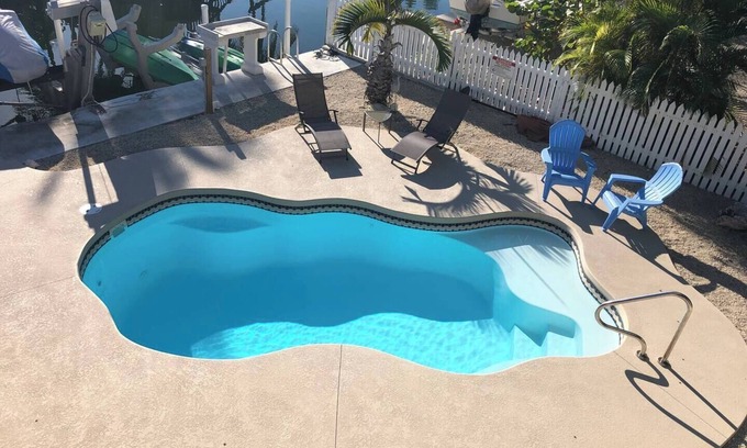 Little Torch Key House | 5 Pirate's - Pool & seawall for boat. This is a pet friendly home. A pet fee and approval of your pet is required.