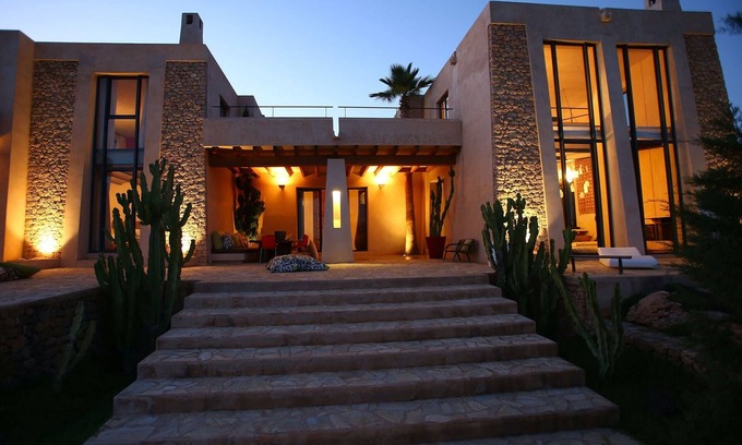 Sant Josep de sa Talaia Villa | A modernist fortress with bohemian interior in a fantastic Es Cubells location