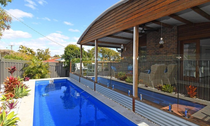 Scarness House | All Decked Out - Spacious split-level family or fishing retreat with pool, WIFI and room for the boa
