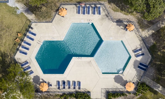 St. Johns Apartment | All Inclusive Studio that can sleep up to 4 people! Pool, Gym & Laundry onsite.