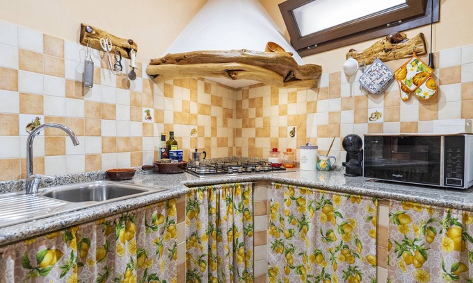 Baunei Apartment | Apartment 'Appartamento Domm'e Orrosaria' with Mountain View, Balcony and Air Conditioning