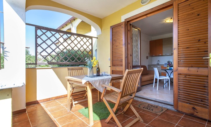 Pirotto Li Frati House | Apartment "Baia delle Mimose 50 Meters from the Sea" with Private Garden & A/C