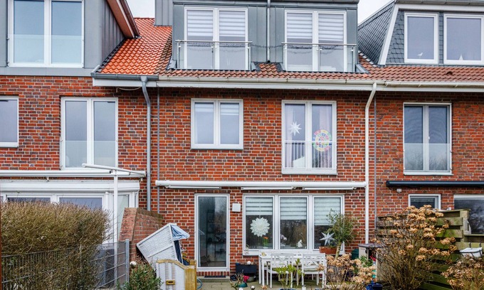 Norderney House | Apartment 'Ferienhaus Raschke' with Sea View, Private Terrace and Wi-Fi