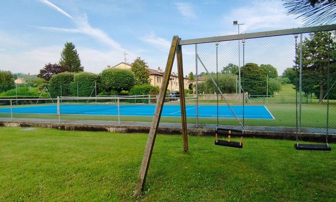 Calmasino Apartment | Apartment 'Golf Residence La Ca' with Shared Pool and Private Garden