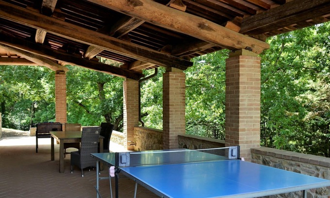 Chianni Villa | Apartment in villa with sauna, WIFI, pool, hot tub, TV, patio, pets allowed, panoramic view, parking